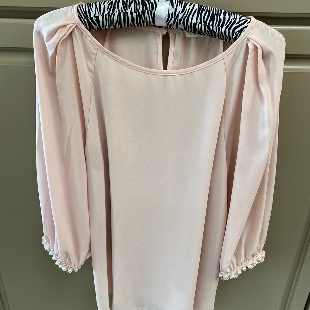 Light pink blouse with pearl detailing
